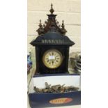 A late-19th/early-20th century stained wood striking mantel clock of architectural form, 54cm