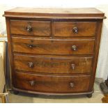 A Late-Victorian stained mahogany bow-front chest of two short and three long drawers, 115cm wide