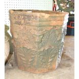 A terracotta octagonal planter, a rectangular cast concrete planter and another, (3).