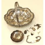 A plated pierced bonbon dish with swing handle, 19cm wide, a small silver circular pin tray