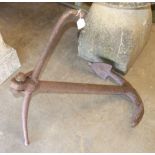 An iron boat anchor, 76cm high.