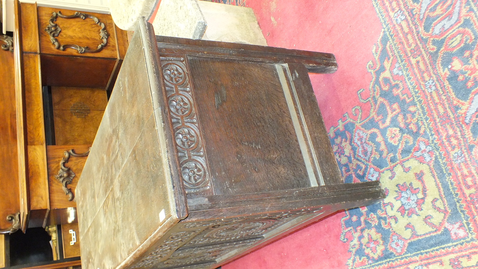 An antique oak coffer with carved panel front, 140cm wide. - Image 4 of 13