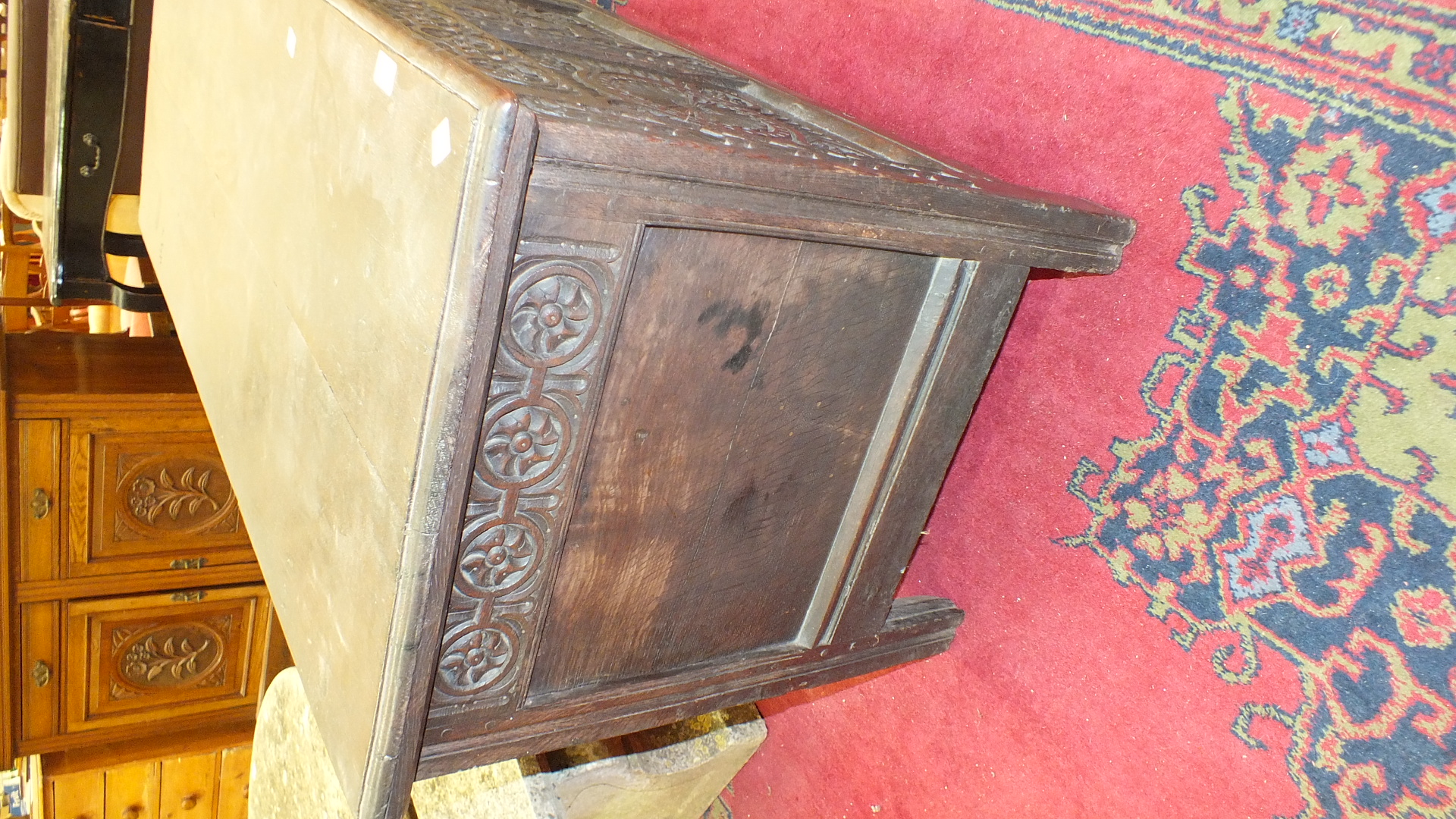 An antique oak coffer with carved panel front, 140cm wide. - Image 5 of 13