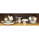 Twenty-one pieces of Royal Albert 'Heirloom' decorated teaware.