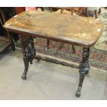 A Late-Victorian inlaid walnut shaped rectangular-top table on turned end supports.