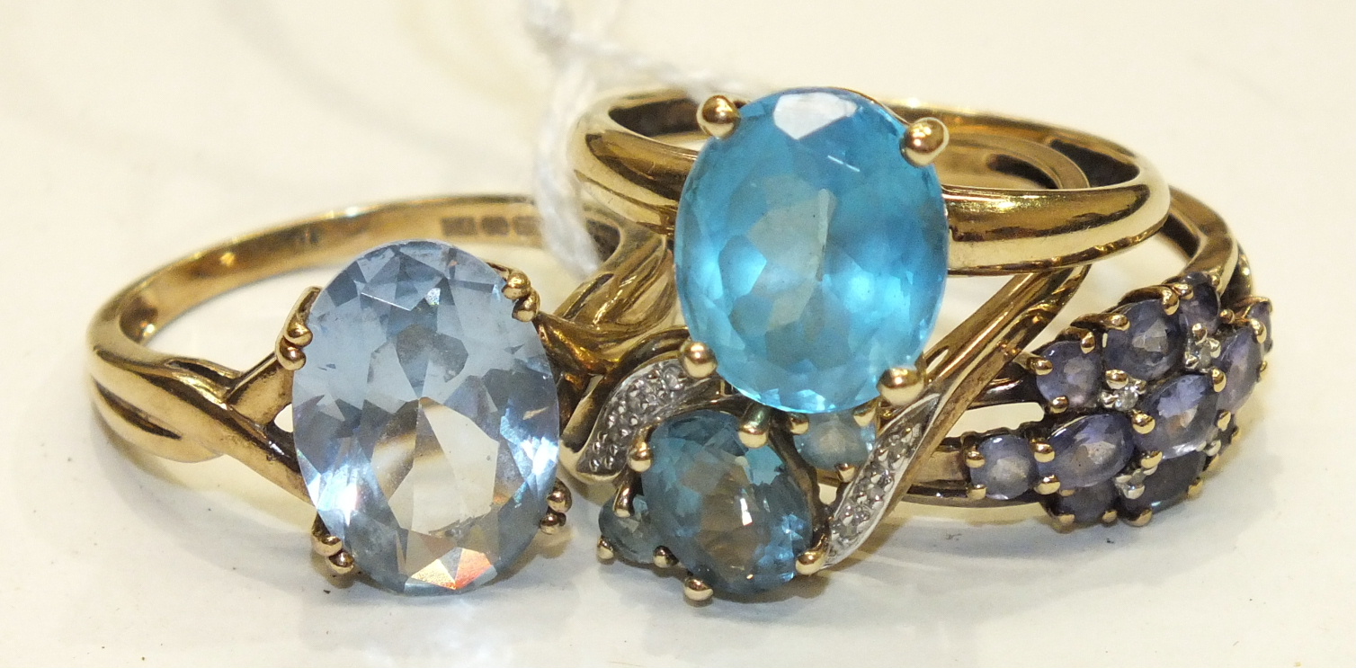 Three 9ct gold gem-set rings by QVC and one other, similar, sizes T-V, gross weight 13g, (4).