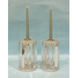 A pair of cut-glass lustre candle holders, 22cm high, (lustre drops chipped), (2).