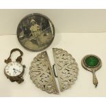 A Late-Victorian buckle of pierced foliate decoration, 9 x 7.5cm, ___2oz, a silver-cased wrist