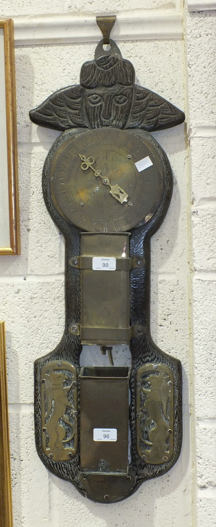 A brass and wood replica water clock with brass dials and reservoirs, on an oak frame, signed 'Henry