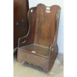 An early-20th century child's rocking chair, 60cm high.