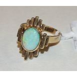 A contemporary 14k gold ring collet-set an oval opal, size P½, 6.8g.