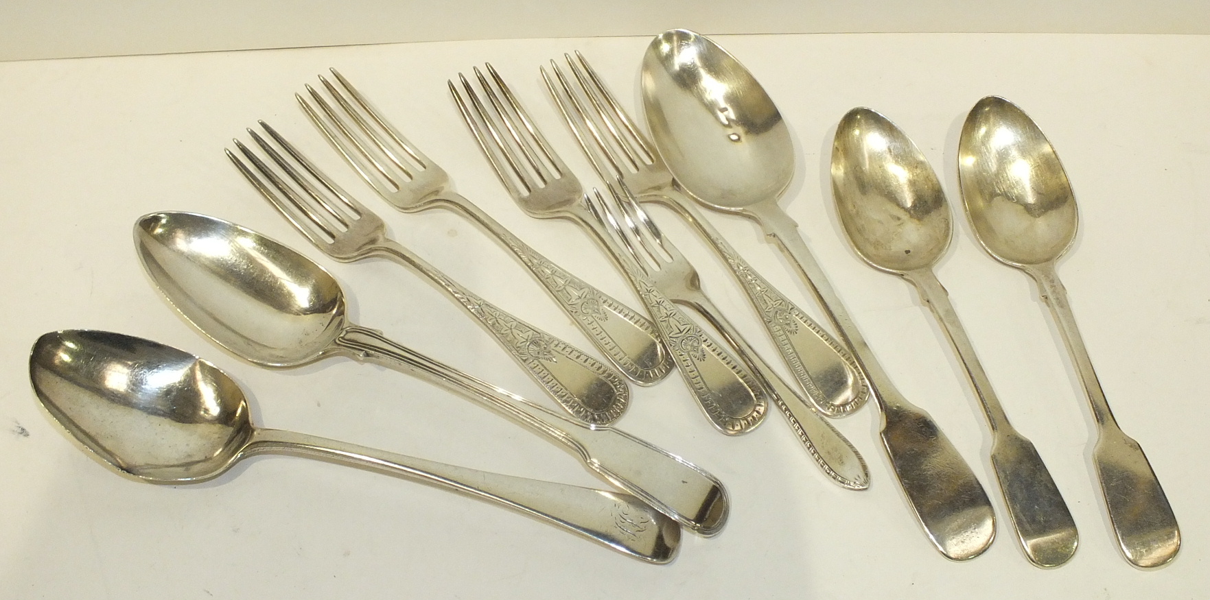 Three 19th century silver tablespoons, two dessert spoons, various dates, four sterling silver forks