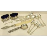 Ten silver coffee spoons, London 1919, a pair of silver salts with blue glass liners, Birmingham