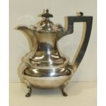 A Walker & Hall silver coffee pot of plain baluster form, 22cm high, Sheffield 1941, total weight
