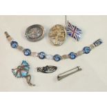 A Stainton Bros enamelled silver-link bracelet, Birmingham 1911, (a/f), a small unmarked brooch in