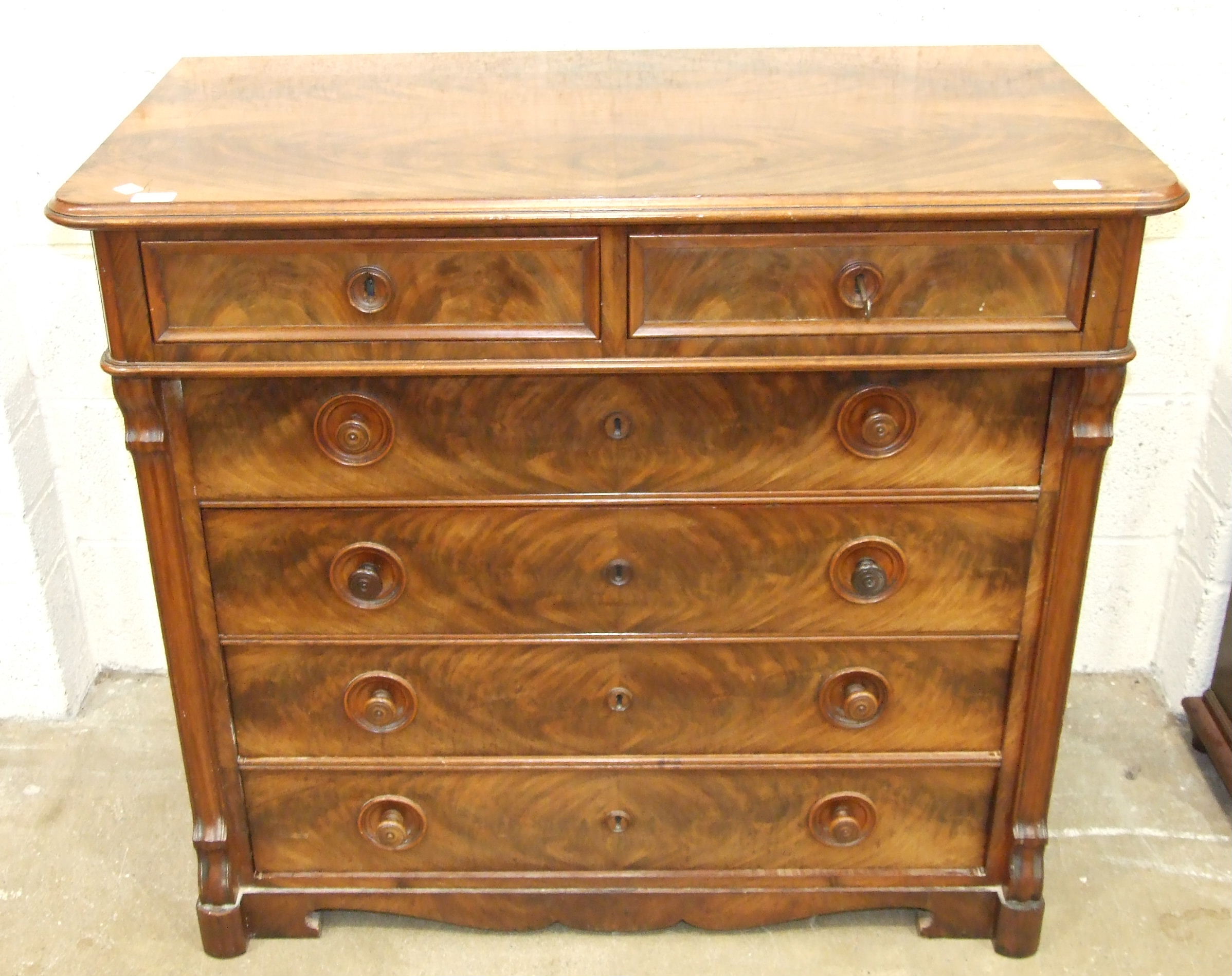 A 19th century Continental mahogany chest of two short and four long graduated drawers, on cut- - Image 4 of 4