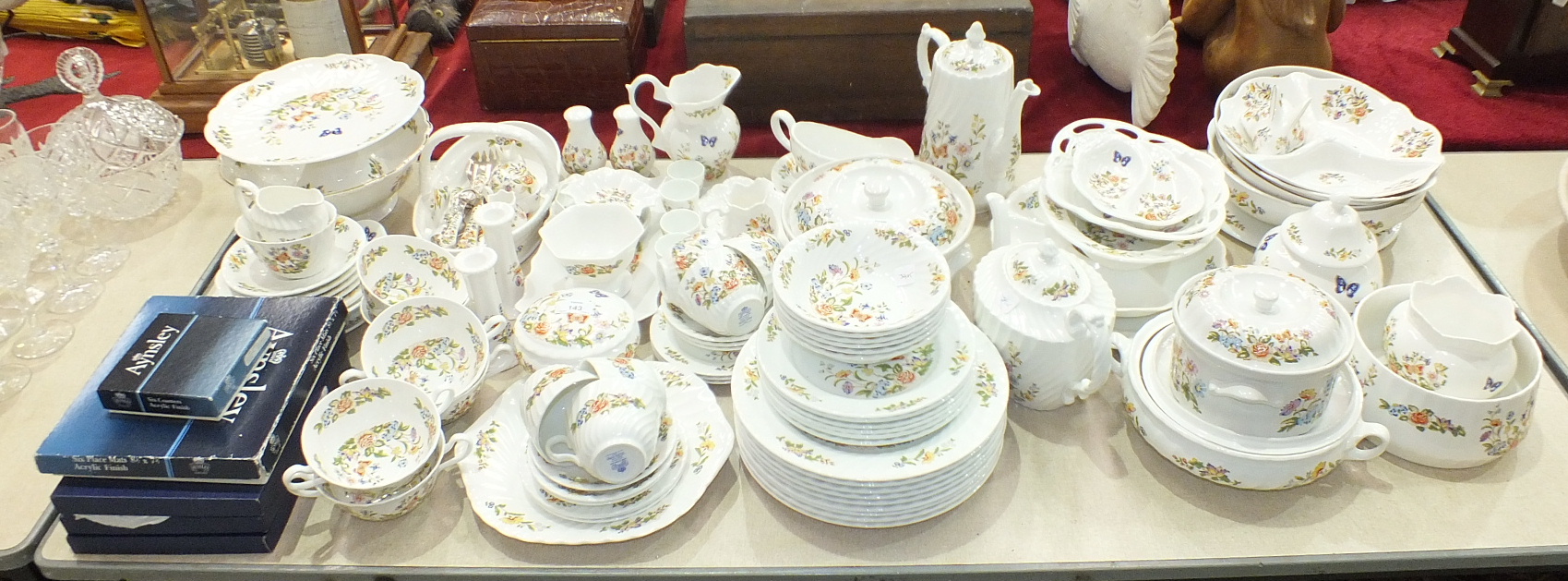 Approximately one hundred pieces of Aynsley 'Cottage Garden' decorated tea and dinner ware, bowls,