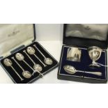 A modern silver napkin ring, egg cup and spoon, in fitted box, together with a set of six coffee