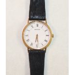 Accurist, a gents "Accurist Gold" 9ct gold wrist watch with quartz movement, on leather strap,