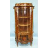 A 19th century rosewood Vernis Martin display cabinet with bowed, glazed sides and triple concave