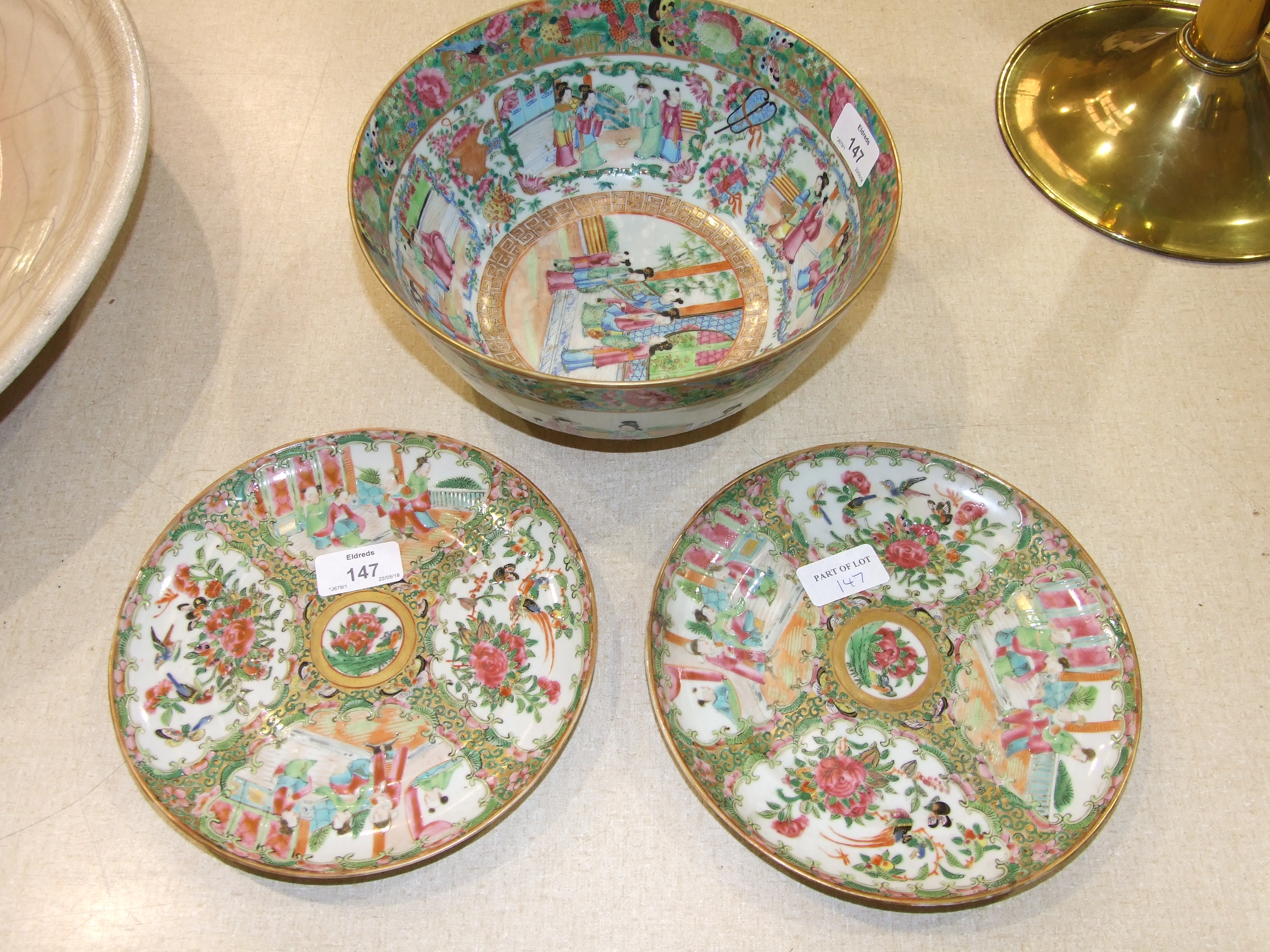 A Canton bowl, typically-decorated with panels of figures within a border of flowers, birds and
