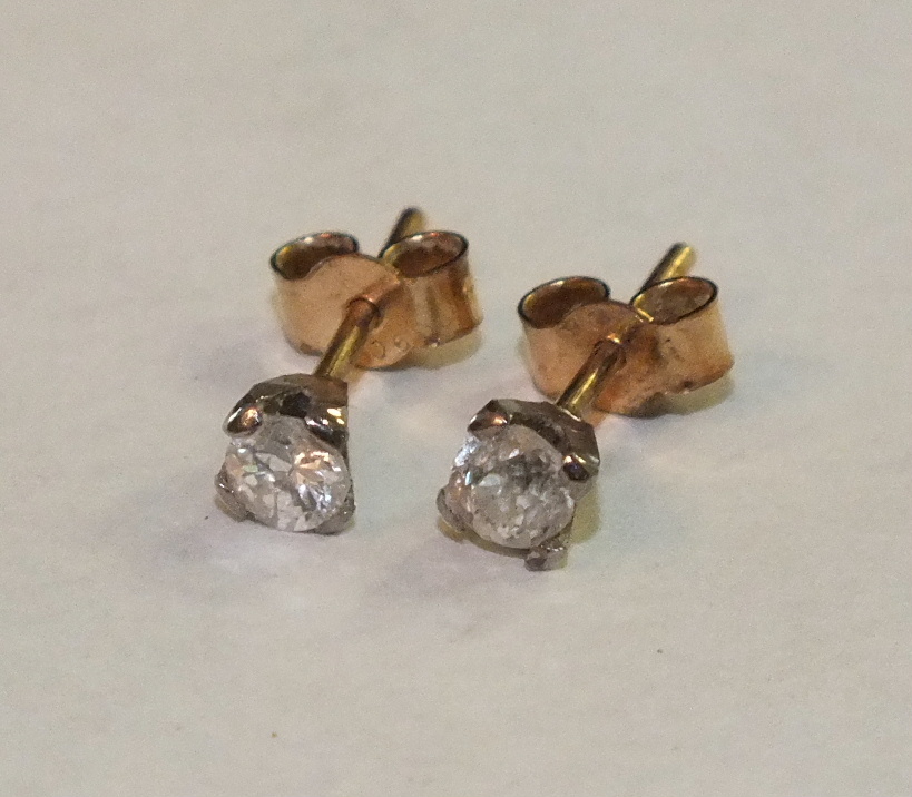 A pair of diamond ear studs, each old brilliant-cut diamond 0.12ct approximately, unmarked mounts. - Image 2 of 2