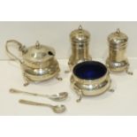 A four-piece silver condiment set, including two peppers, a salt and a mustard pot, Chester 1907,