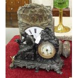 A 19th century French Comtoise clock with convex enamel dial and twin-train movement, striking on