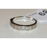 An 18ct yellow and white gold half-eternity ring set nine brilliant-cut diamonds, size R½, 4g.