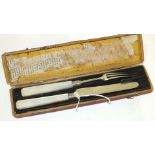 A George III silver fruit knife and fork with mother-of-pearl handles, Birmingham 1808, maker JW, in