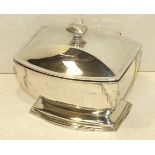 A Walker & Hall silver Art-Deco-style tea caddy of tapering rectangular form, with hinged lid, on