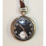 A Damas military keyless pocket watch, the black dial with Arabic numerals and seconds subsidiary,