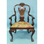 A Chippendale-style mahogany carver chair of generous proportions, the carved frame and drop-in seat