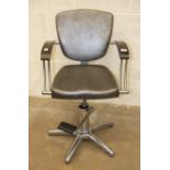 Three REM retro-style chrome-framed hydraulic barber's chairs with padded seats and backs, wood