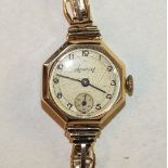 Accurist, a ladies wrist watch with 9ct gold octagonal case and bracelet, 15g.