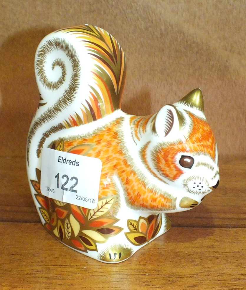 A Royal Crown Derby porcelain paperweight 'Autumn Squirrel', gold stopper, 10cm high.