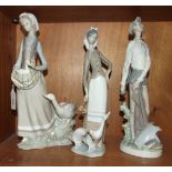 Three Lladro figurines, 'Young girl carrying a duckling within her apron, with larger duck beside