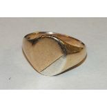 A 9ct gold signet ring, size S, approximately 5.1g.