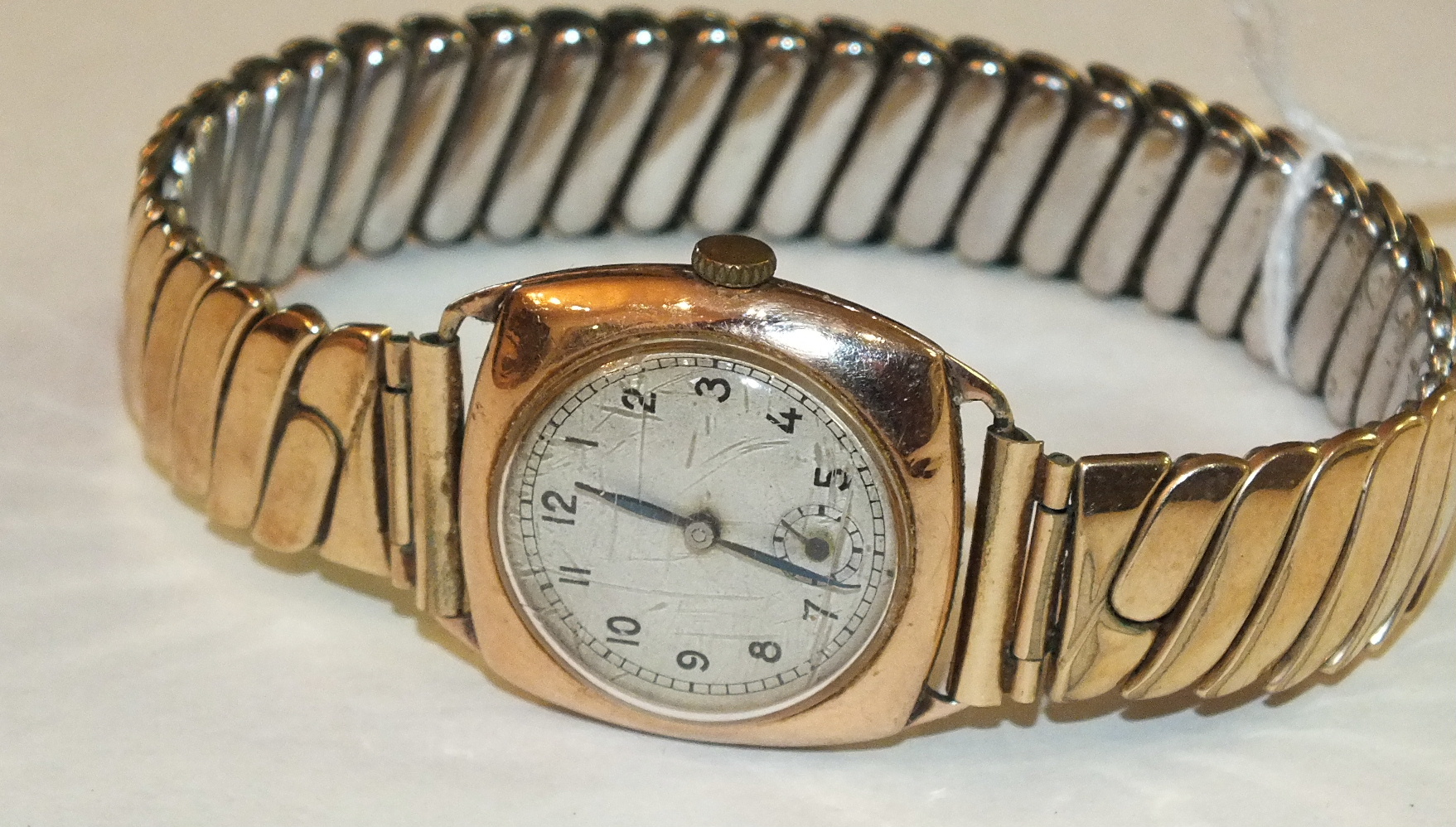 A gentleman's 1940's cushion-shaped 9ct gold wrist watch on plated expanding bracelet, gross - Image 2 of 2