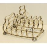 A silver six-division toast rack, 14cm long, 10cm high, Birmingham 1938, ___6oz.