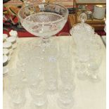 A large cut-glass punch bowl with etched floral and hobnail decoration, on circular foot, 32cm