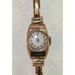 Pinnacle, a ladies wrist watch with 9ct gold case and sprung bracelet.