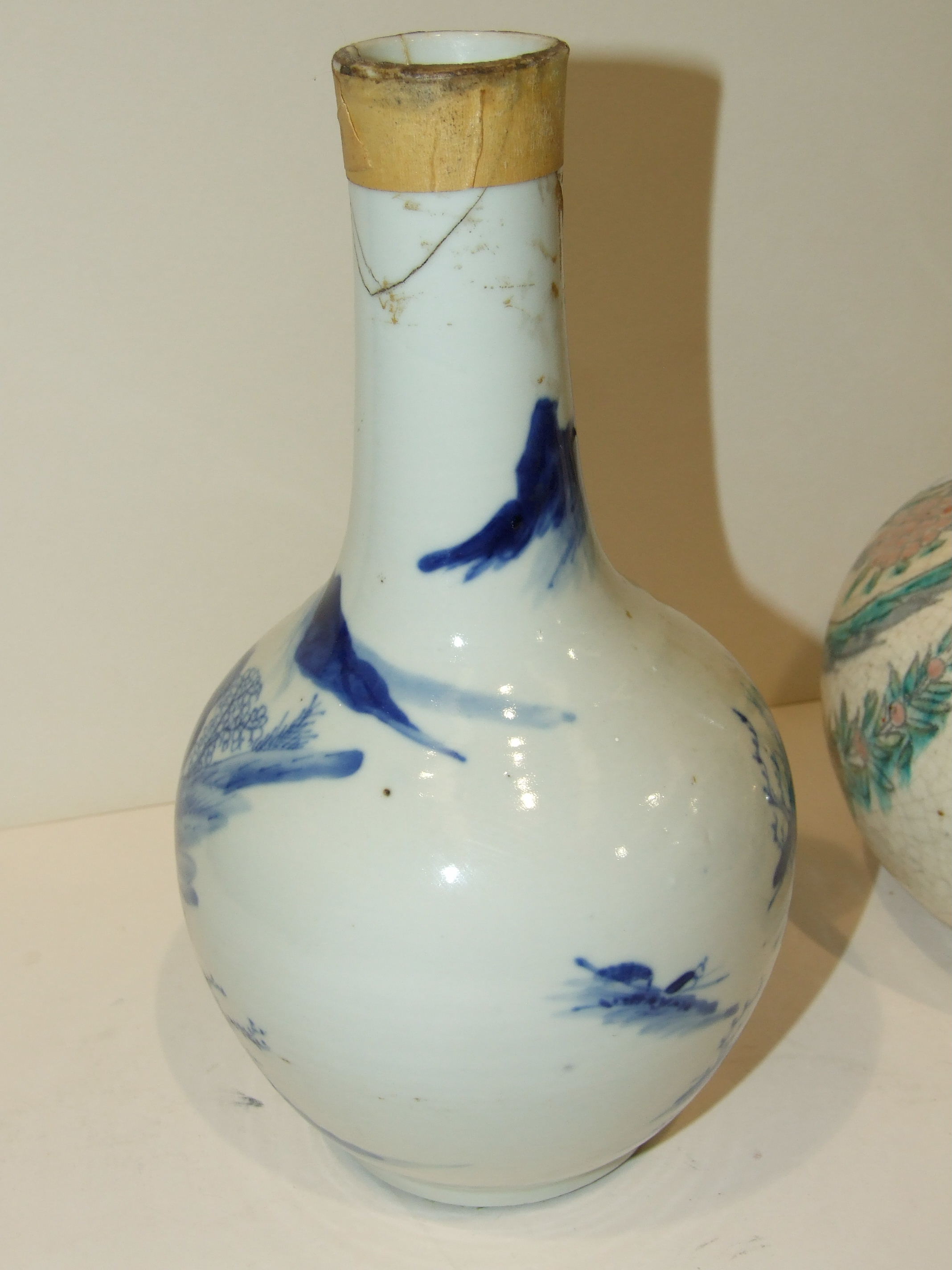 A 19th century Chinese blue and white bottle vase, (damages), 24cm and another, both converted to - Image 4 of 4