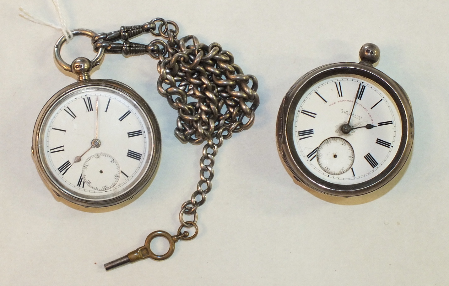 A silver-cased open-face key-wind pocket watch signed 'A King, Hull', on silver Albert chain and