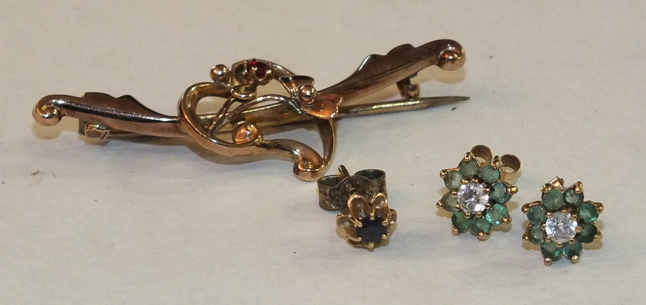 An Edwardian 9ct gold brooch set a small round-cut ruby, 3.2g, a pair of green and white stone - Image 2 of 2