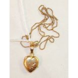 An 18ct gold heart-shaped locket on 18ct gold chain, (a/f), 6.5g.