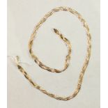 An 18ct tri-coloured gold necklace of plaited chains, 46cm, 13.3g.