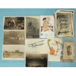 A quantity of loose postcards, including six of coal mining, eleven of ships and submarines, also