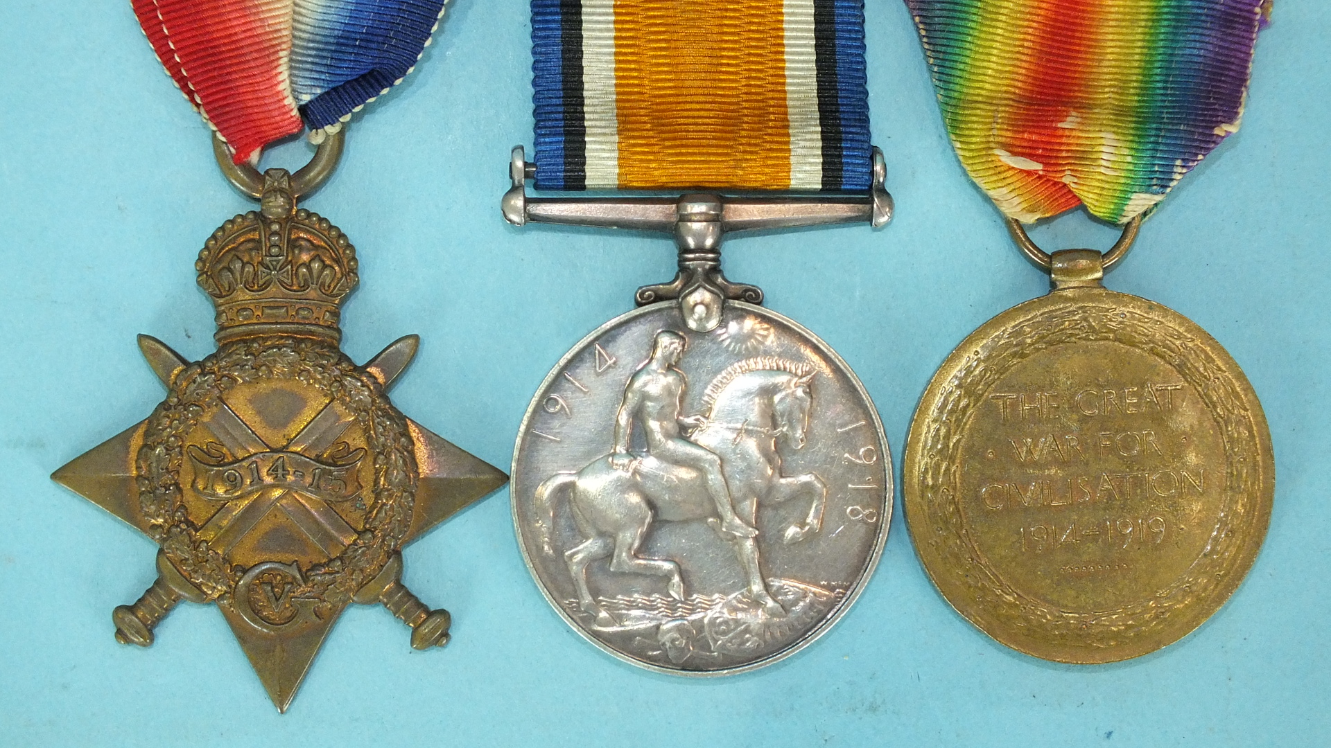 A WWI trio awarded to GS-10926 Pte T F Ridgeway R Fus: 1914-15 Star and British War and Victory