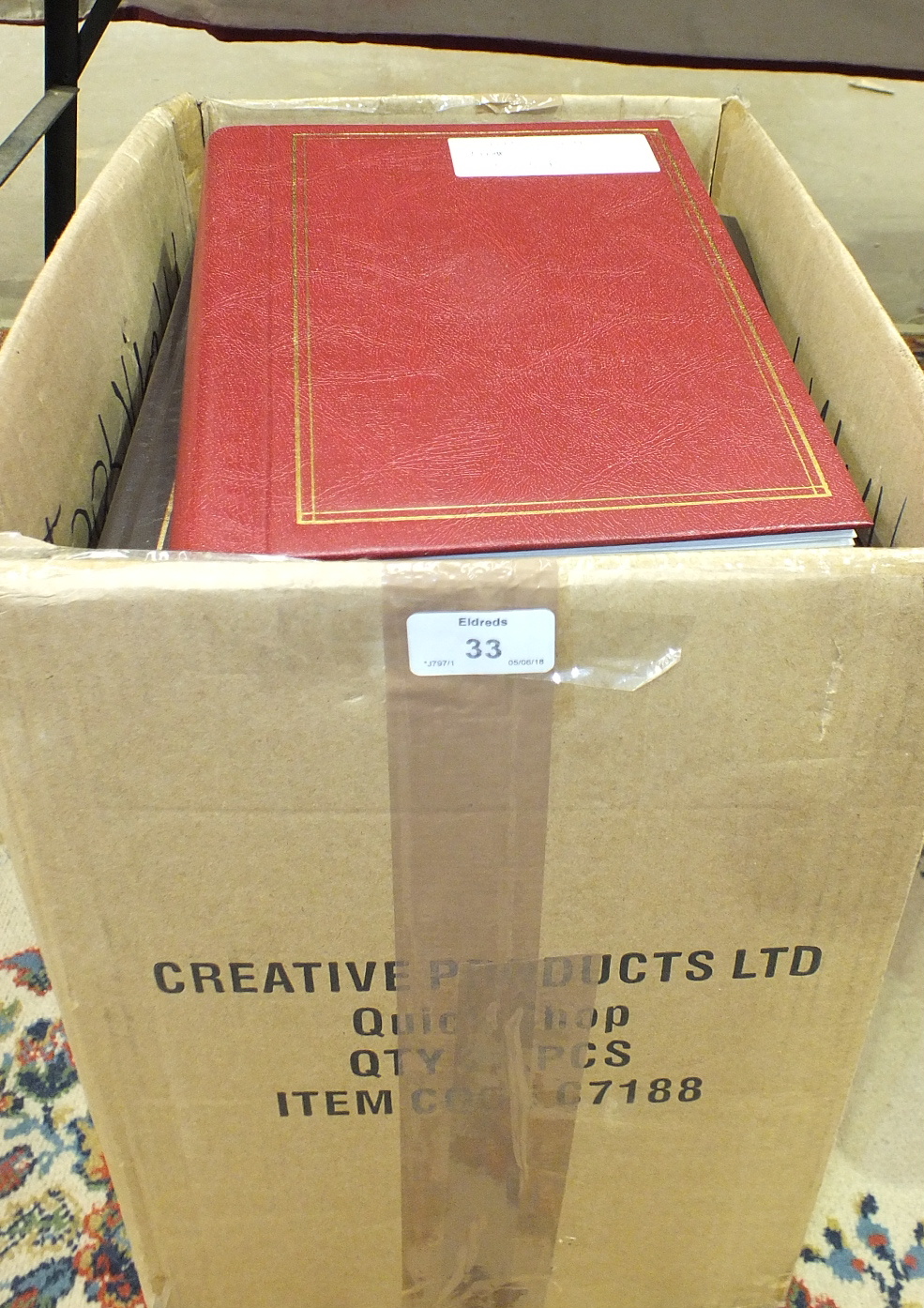 A large accumulation of stamps and covers in albums, stock books and loose, contained in four boxes,